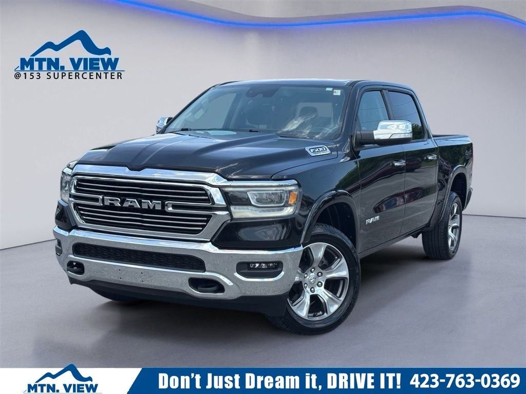 2022 RAM 1500 Laramie in Diamond Black Crystal Pearlcoat — front three-quarter view