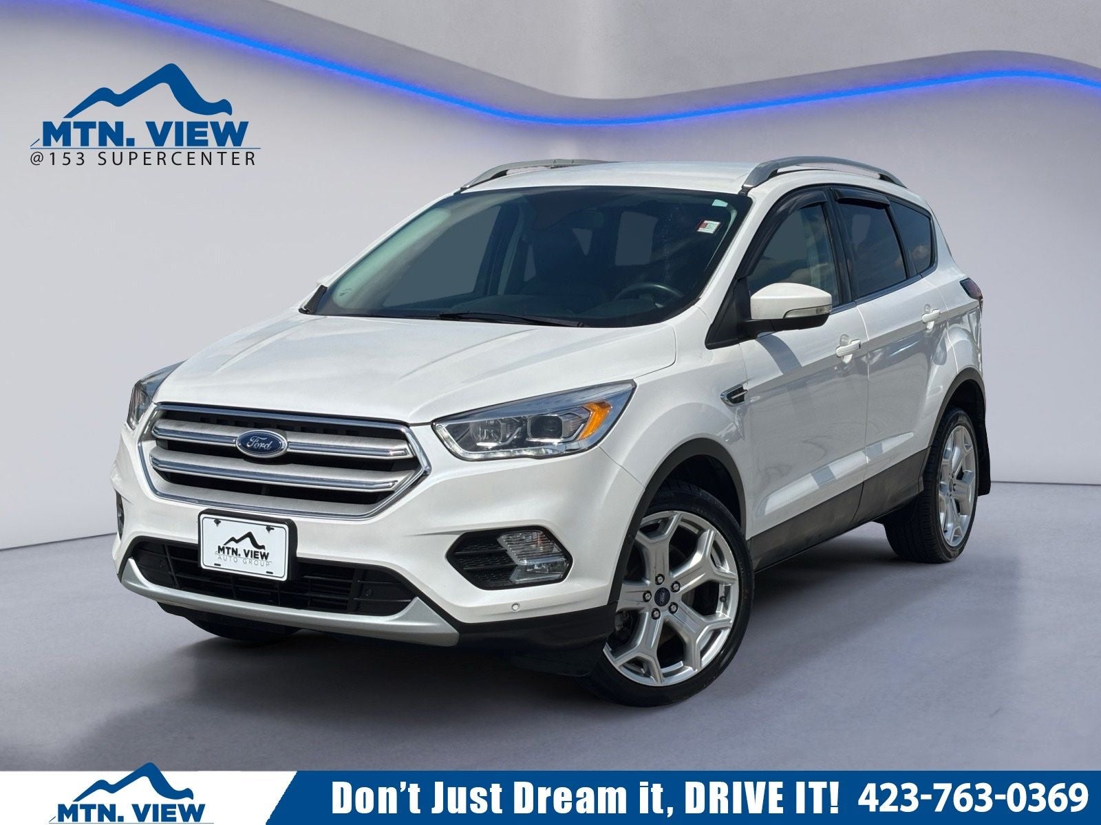 2019 Ford Escape Titanium in White Platinum Clearcoat Metallic — front three-quarter view