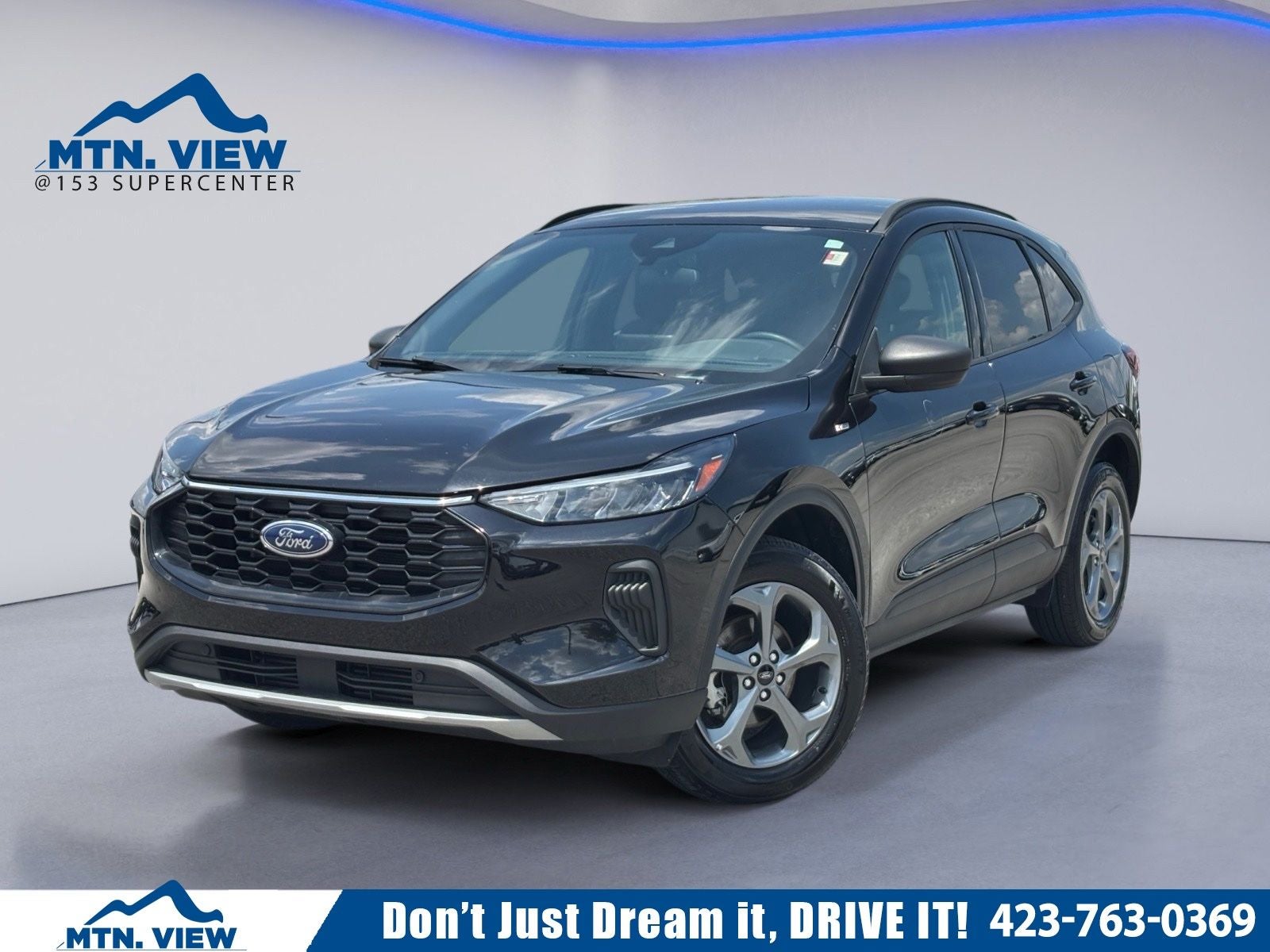 2025 Ford Escape ST-Line in Agate Black Metallic — front three-quarter view