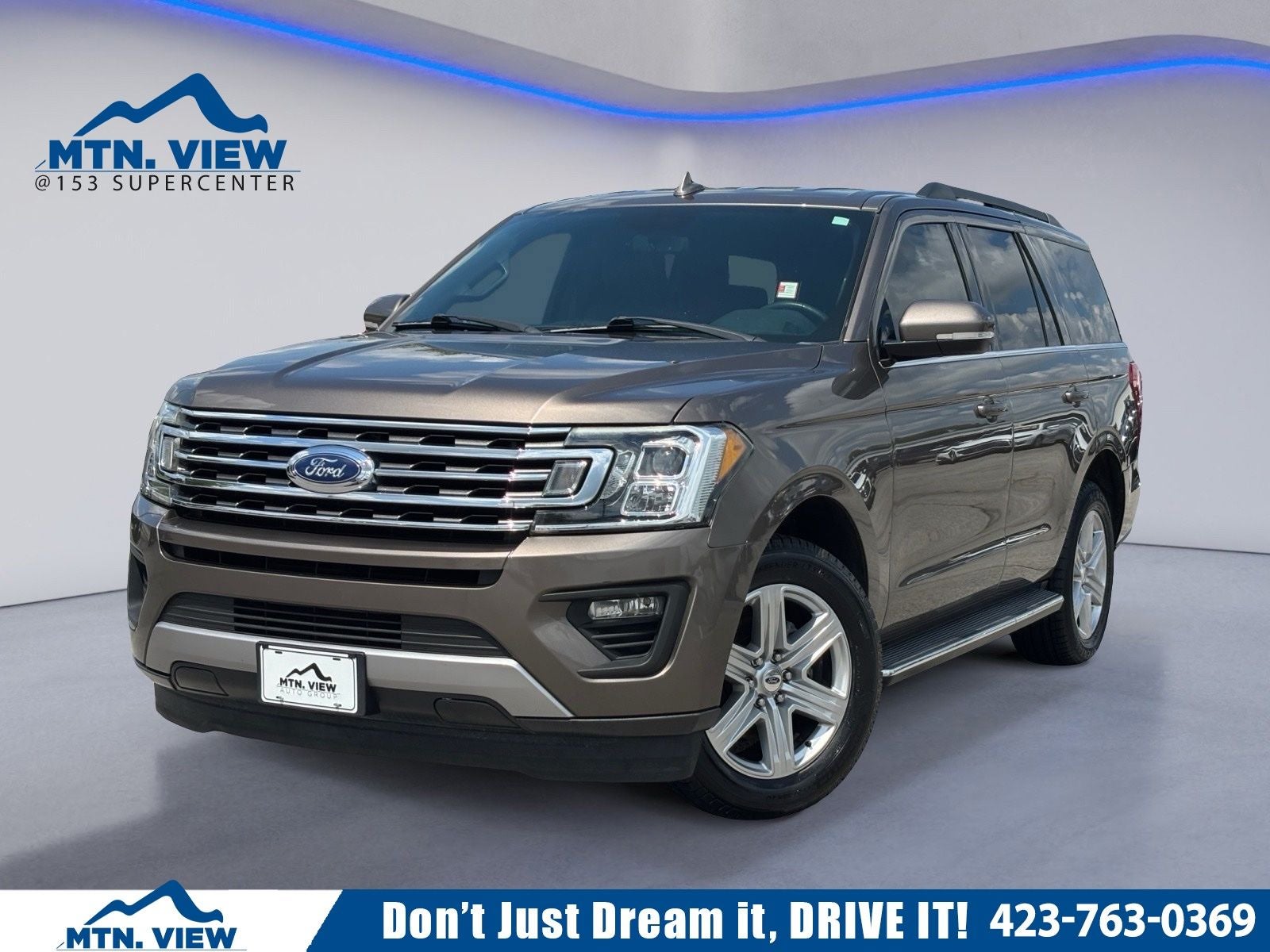 2018 Ford Expedition XLT in Stone Gray Metallic — front three-quarter view