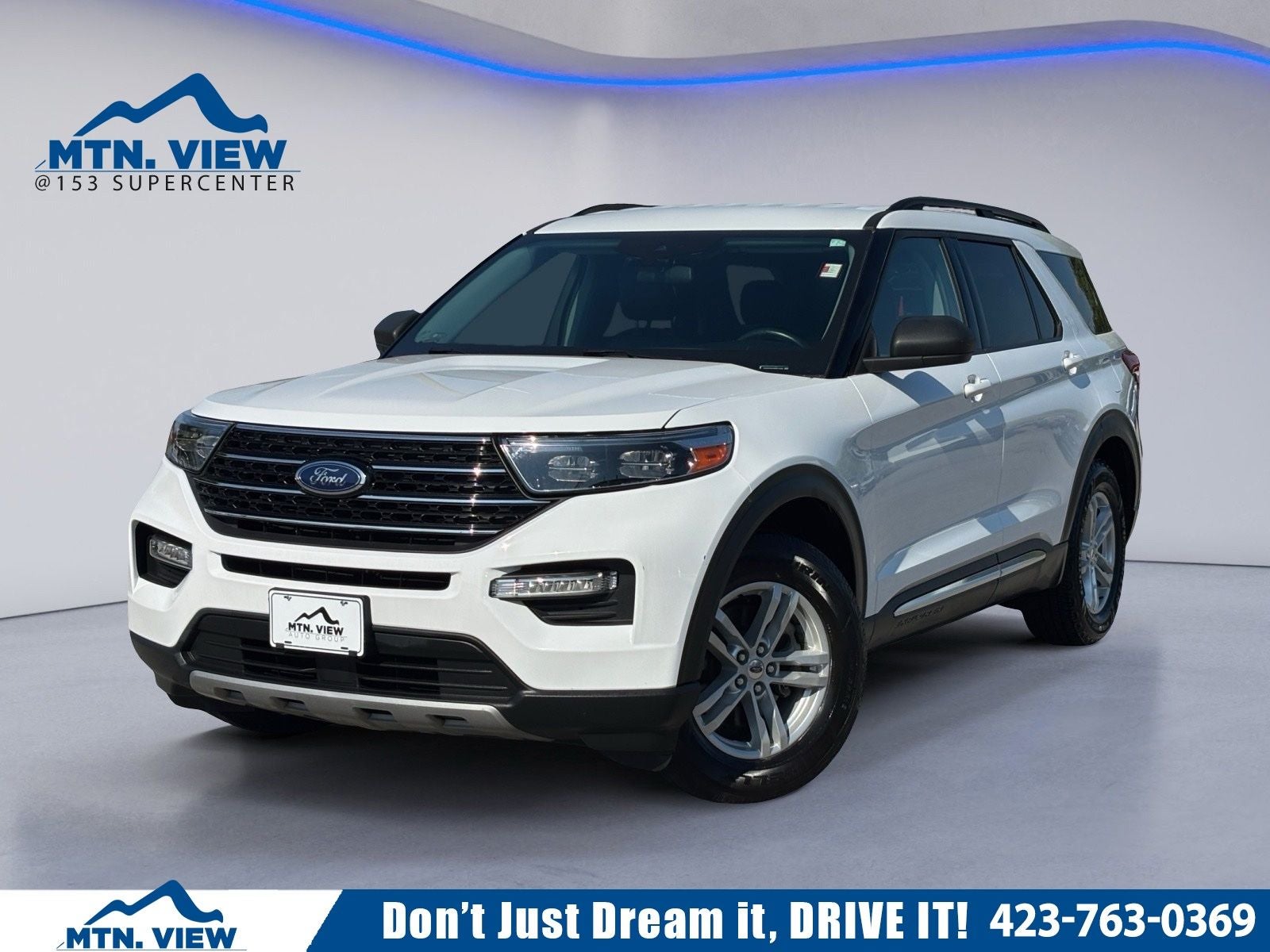 2021 Ford Explorer XLT in Oxford White — front three-quarter view