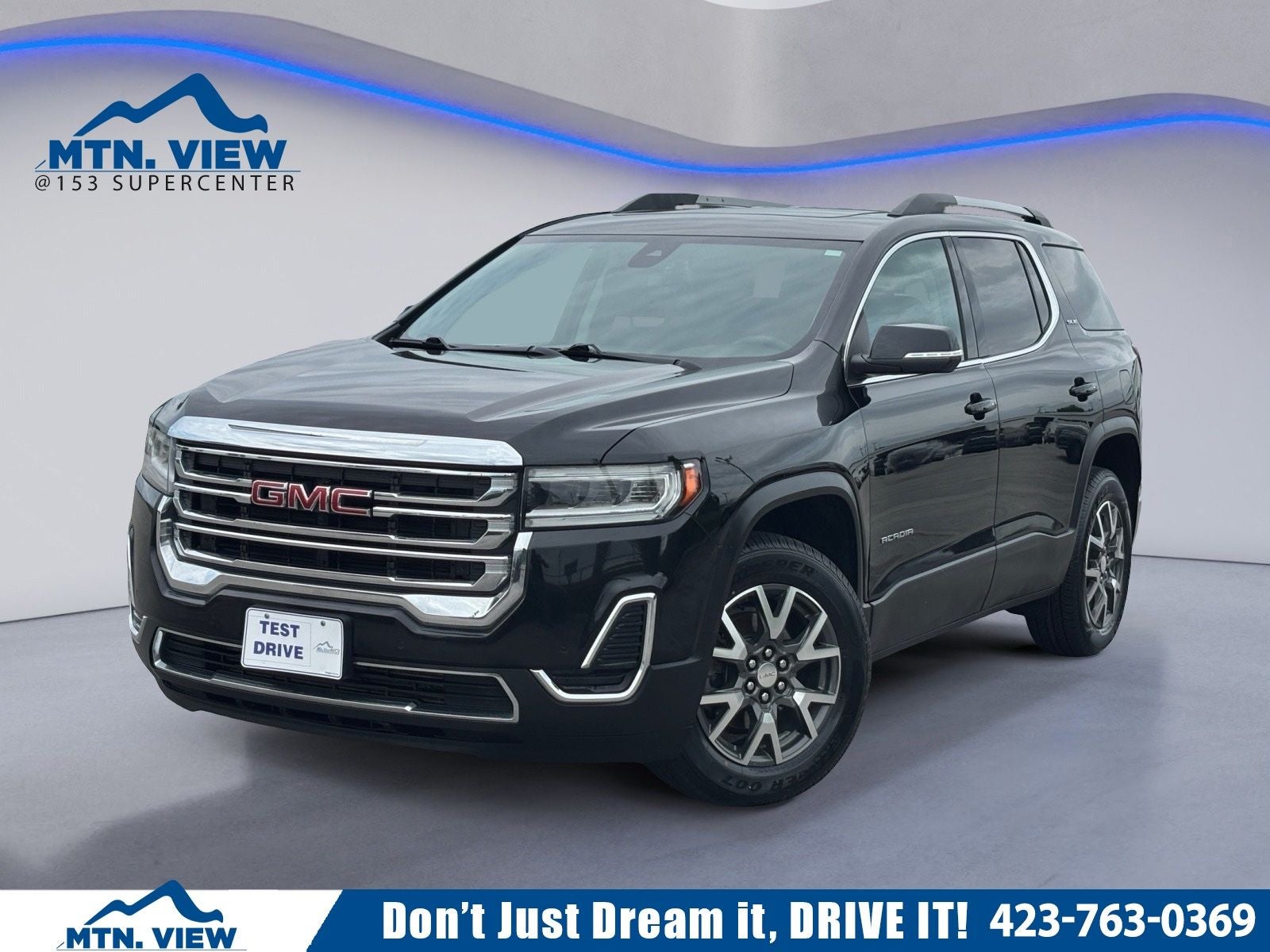 2022 GMC Acadia SLE in Ebony Twilight Metallic — front three-quarter view