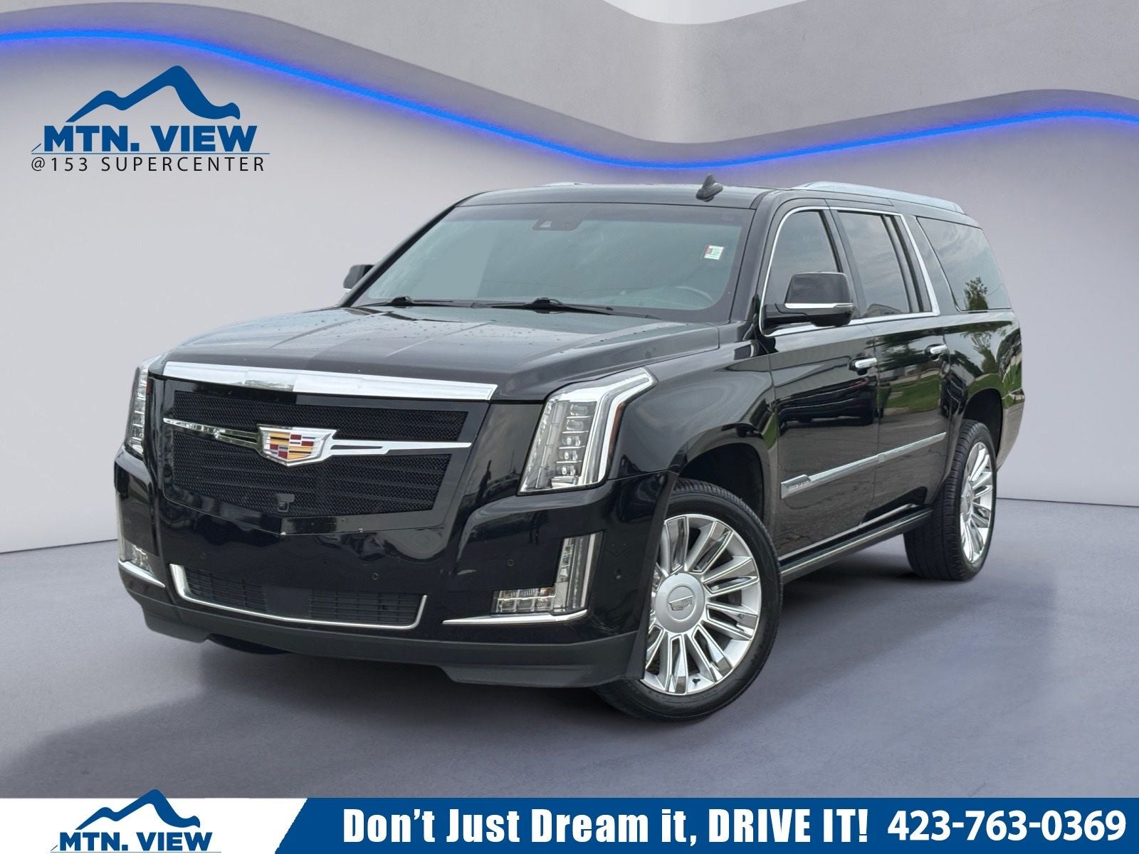 2019 Cadillac Escalade ESV Platinum Edition in Black Raven — front three-quarter view