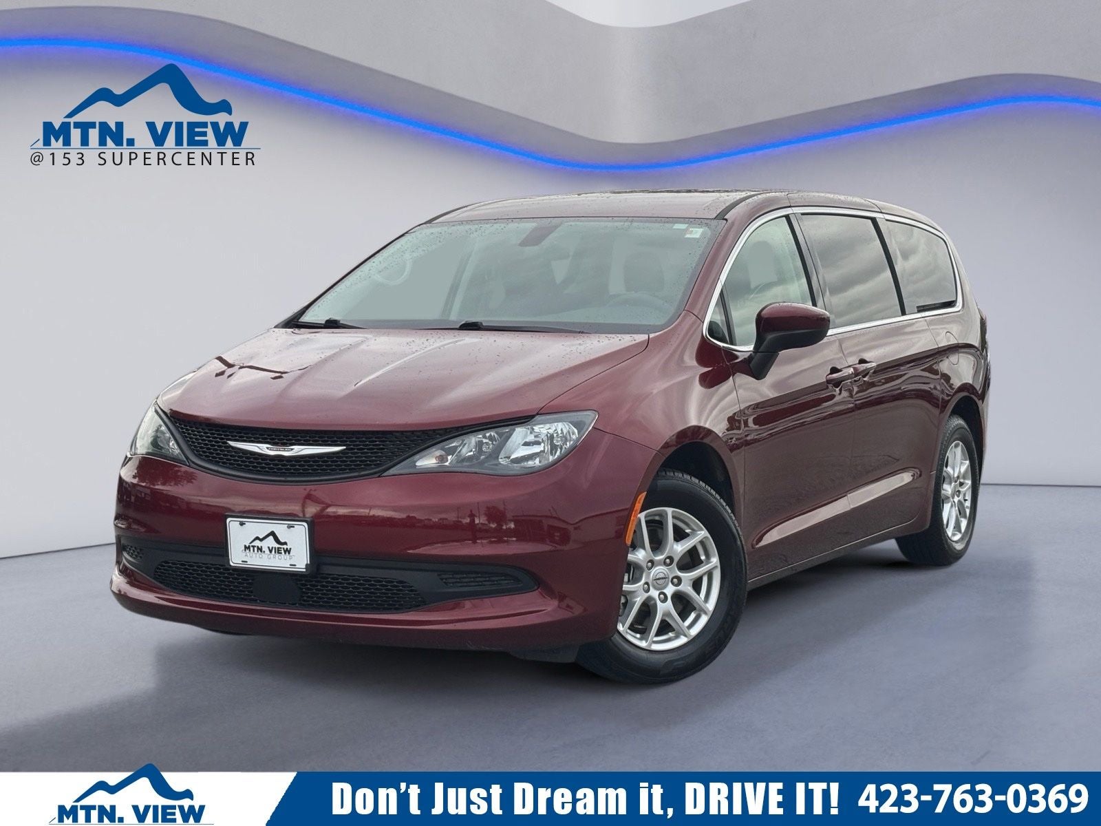 2022 Chrysler Voyager LX in Velvet Red Pearlcoat — front three-quarter view
