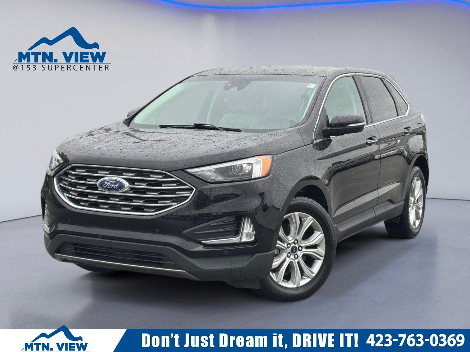 2023 Ford Edge Titanium in Black Metallic — front three-quarter view