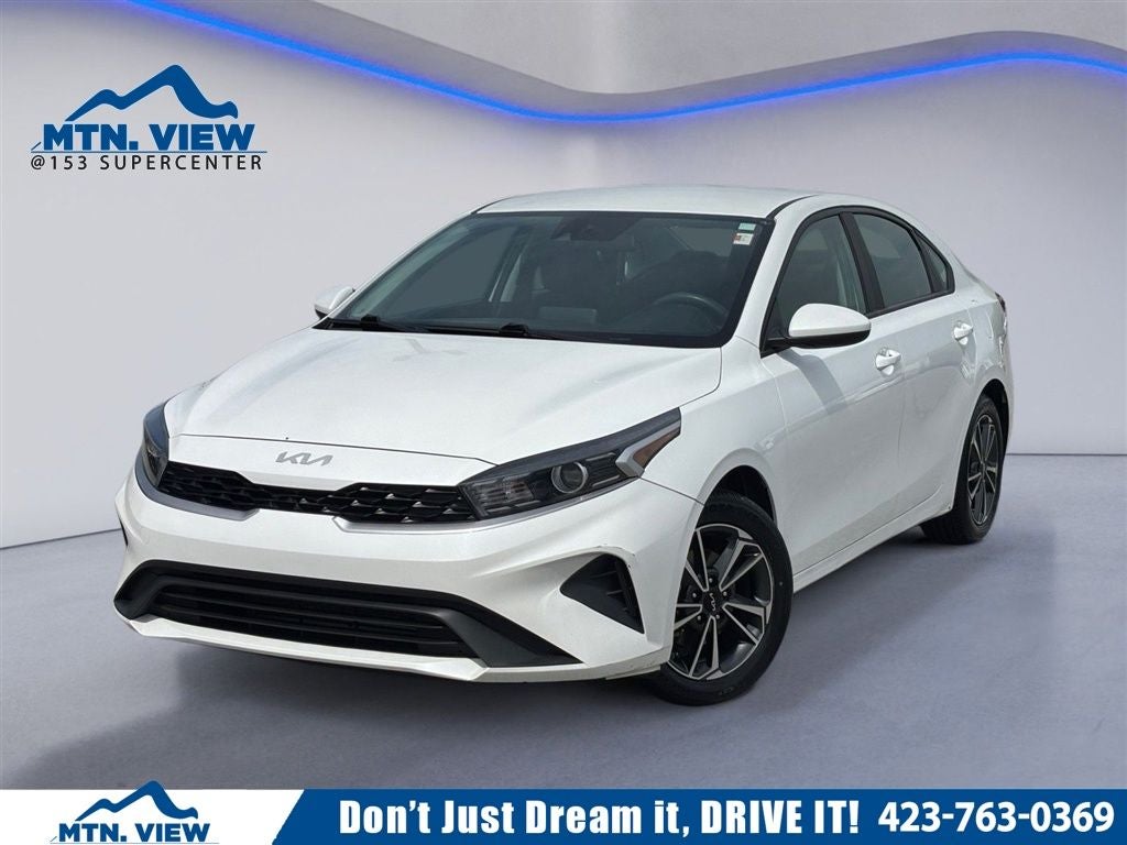 2023 Kia Forte LXS in Snow White Pearl — front three-quarter view
