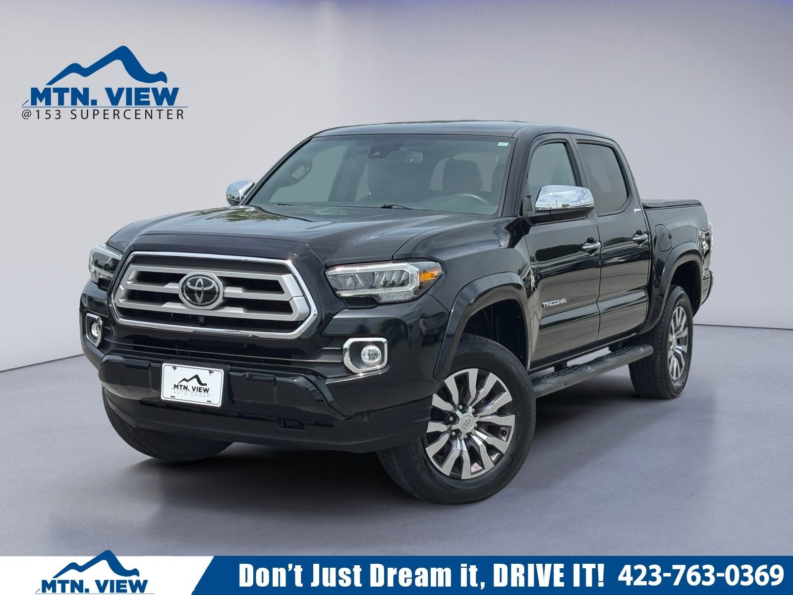 2022 Toyota Tacoma Limited V6 in Midnight Black Metallic — front three-quarter view