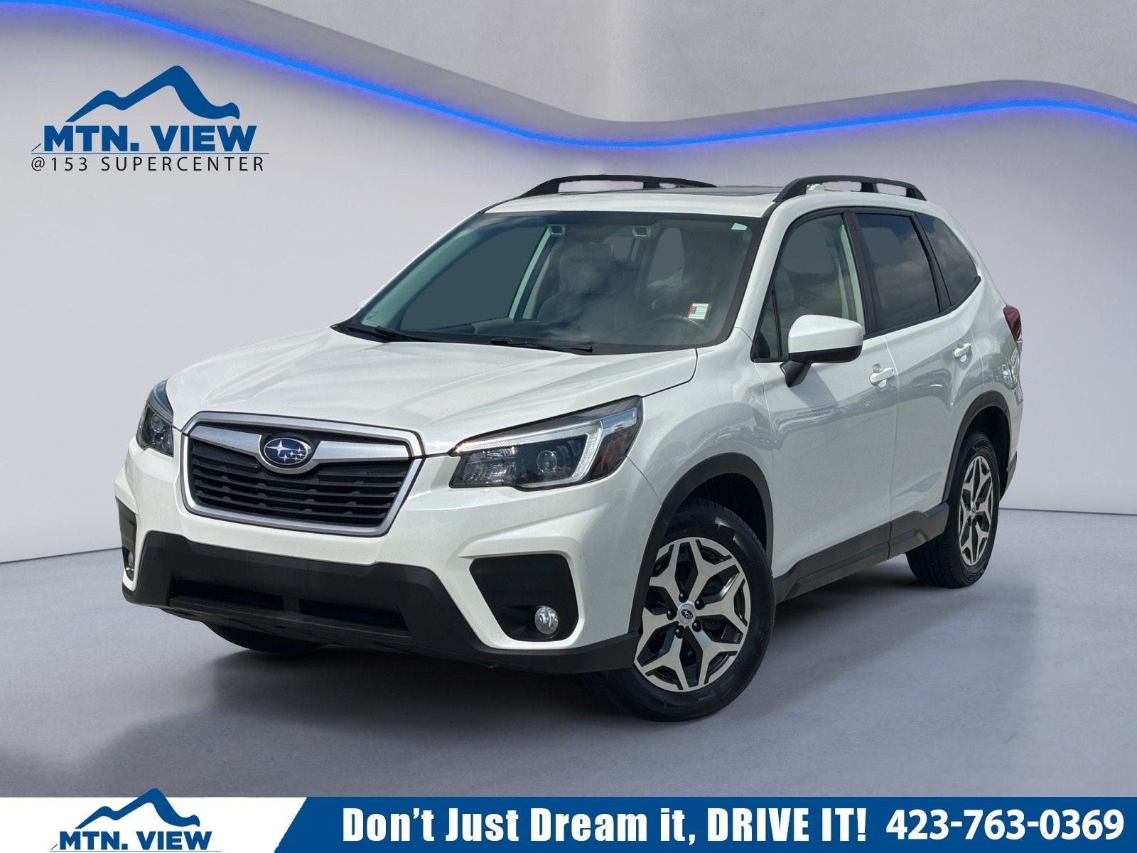 2021 Subaru Forester Premium in Crystal White Pearl — front three-quarter view
